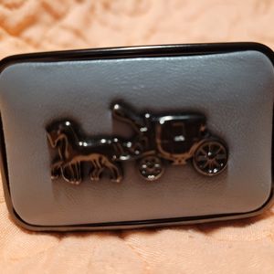 Gray Coach women's belt